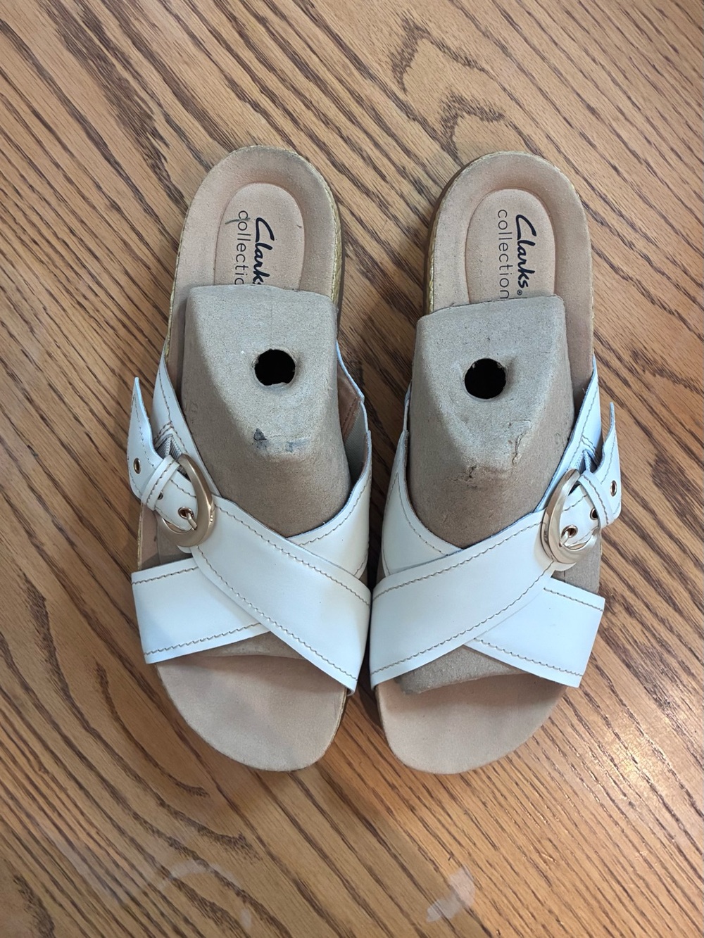 Clarks White Crisscross Slide Sandals with Gold Buckle